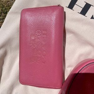 Pink COACH purse, barely used. Pink COACH wallet, a little more worn but,cleaned